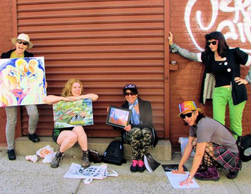 Artist Ava Day posing with Wander Artists Group